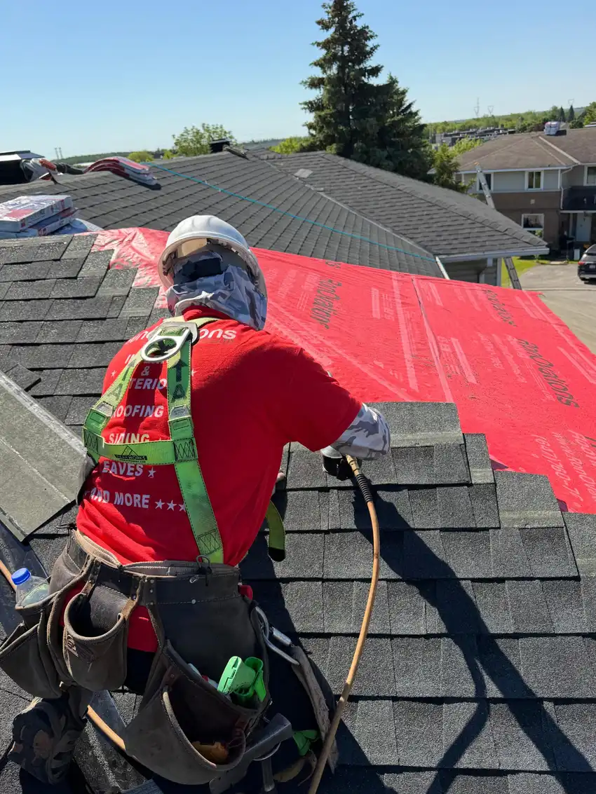 Completed asphalt shingle roof on a residential home